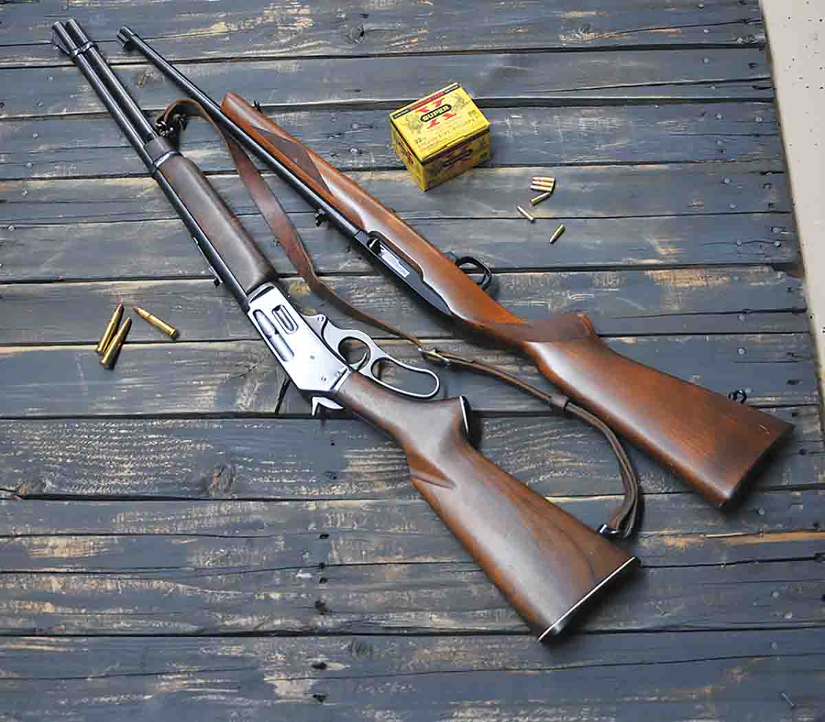 At right, Lee’s father’s Ruger Model 10/22 Sporter rifle (circa 1970) provided a  foundation of safe shooting and hunting experiences for several young shooters. Left, the Marlin .30-30 remains in excellent condition and gets  a workout now and then.